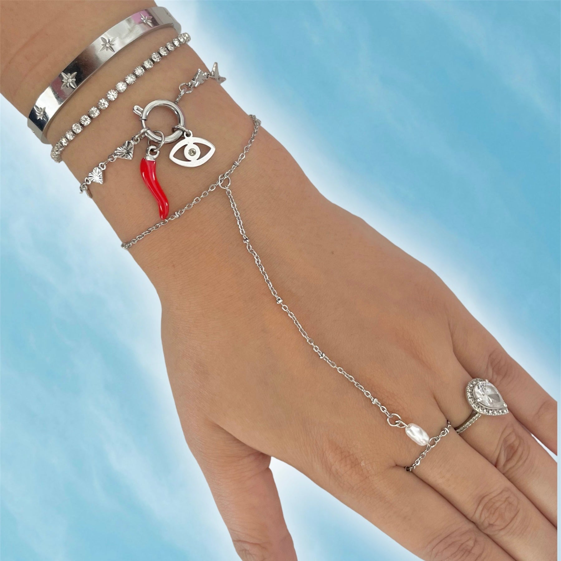 Silver charm bracelet stack