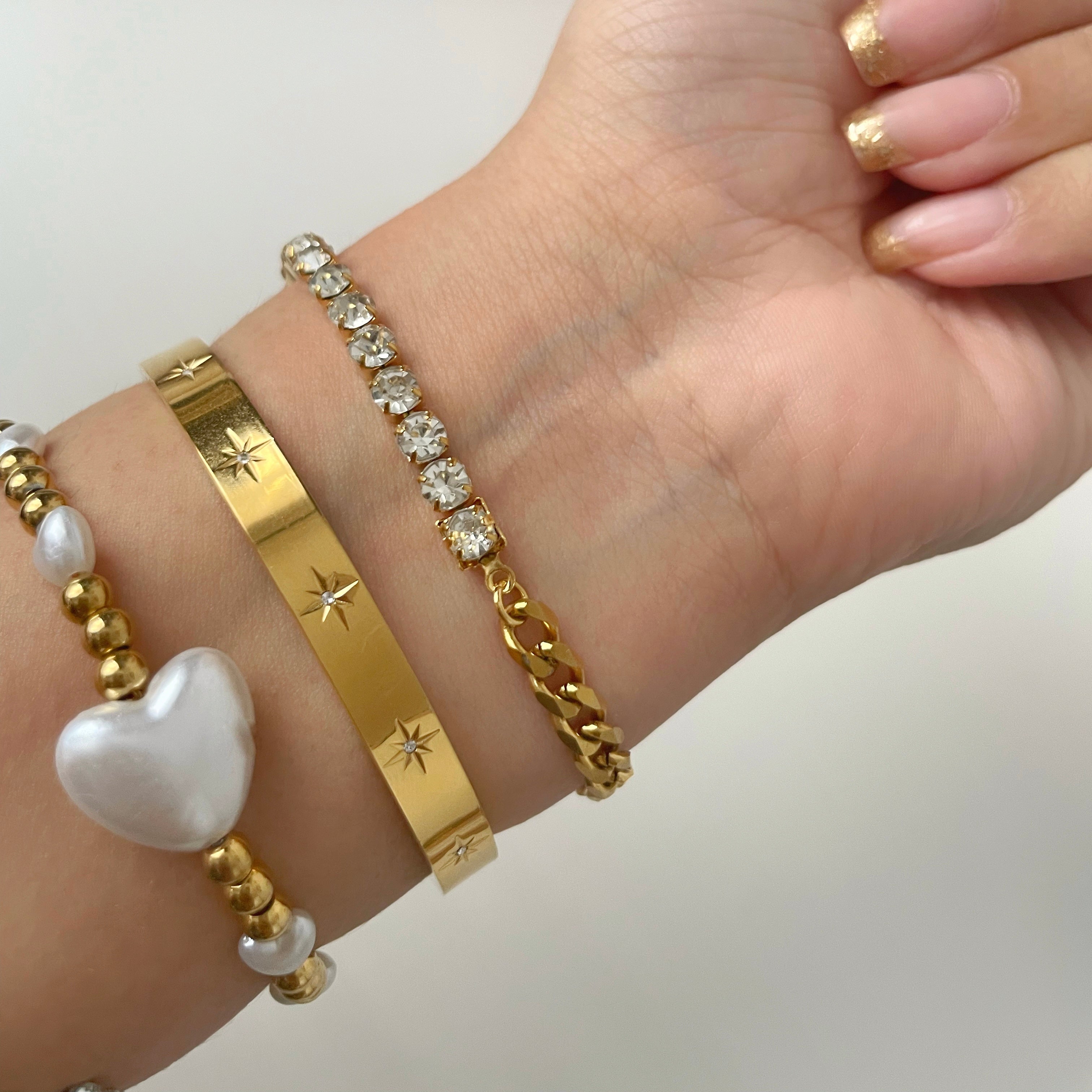 gold cuff bracelet stack inspo