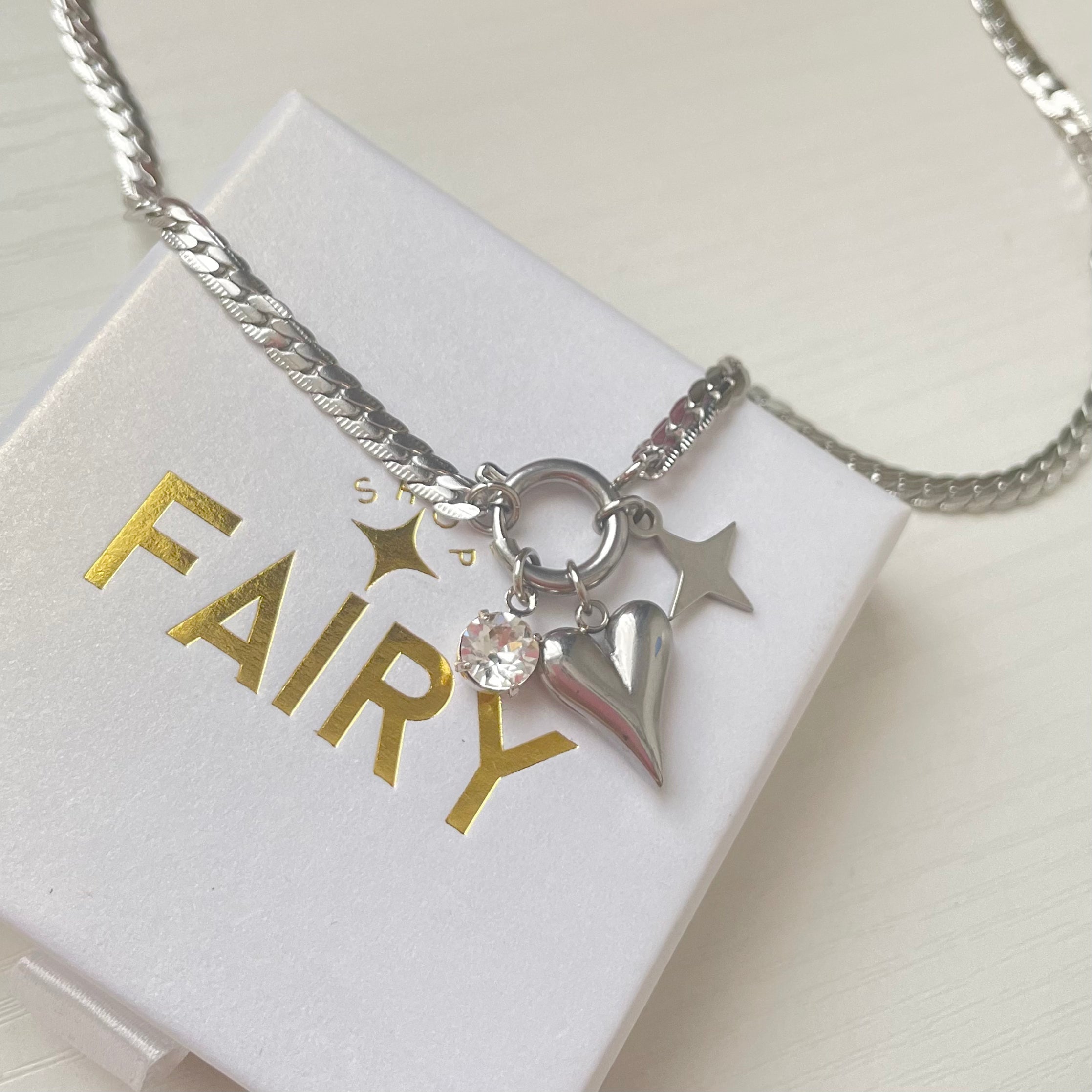 silver charm necklace with heart charm