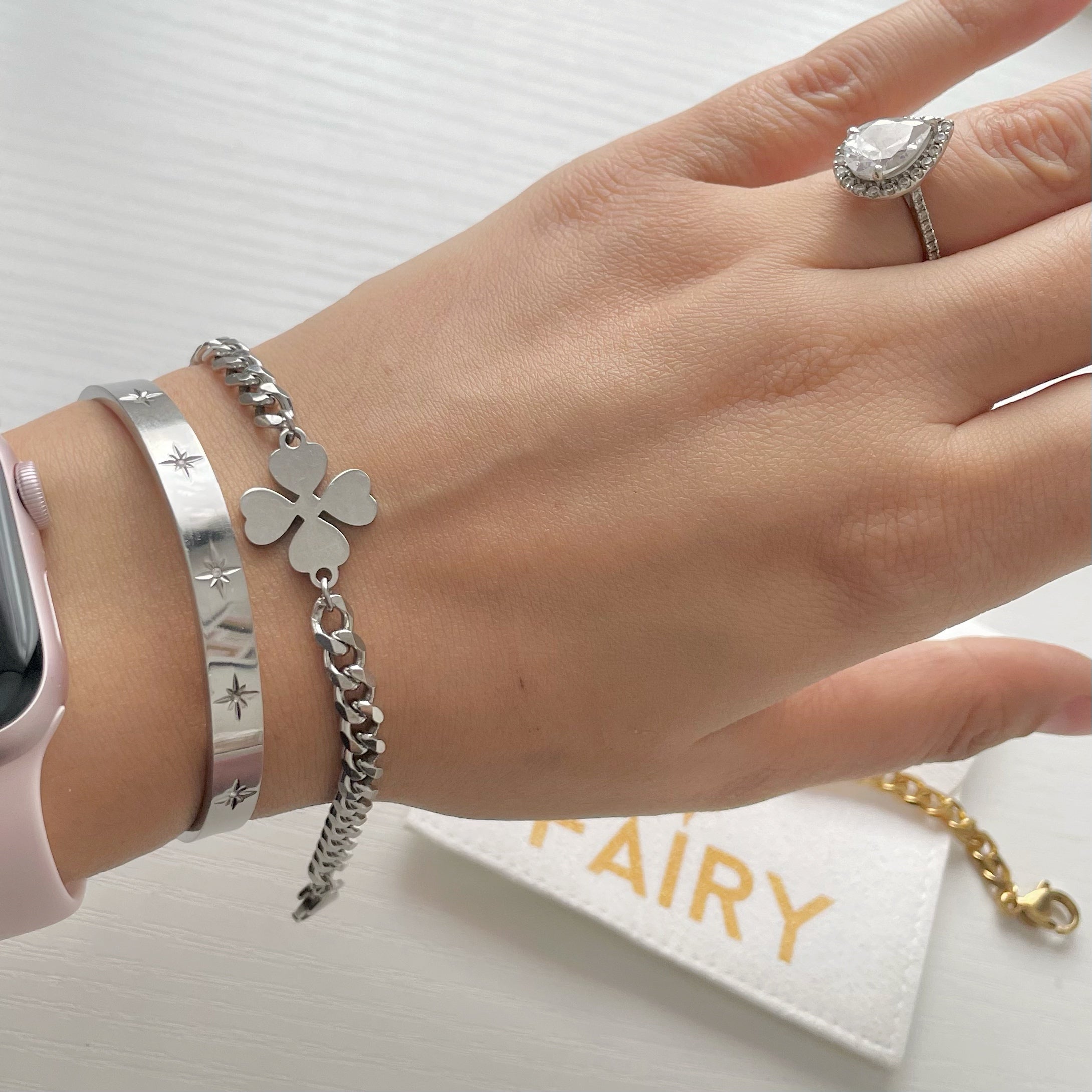 silver clover bracelet and cuff bracelet