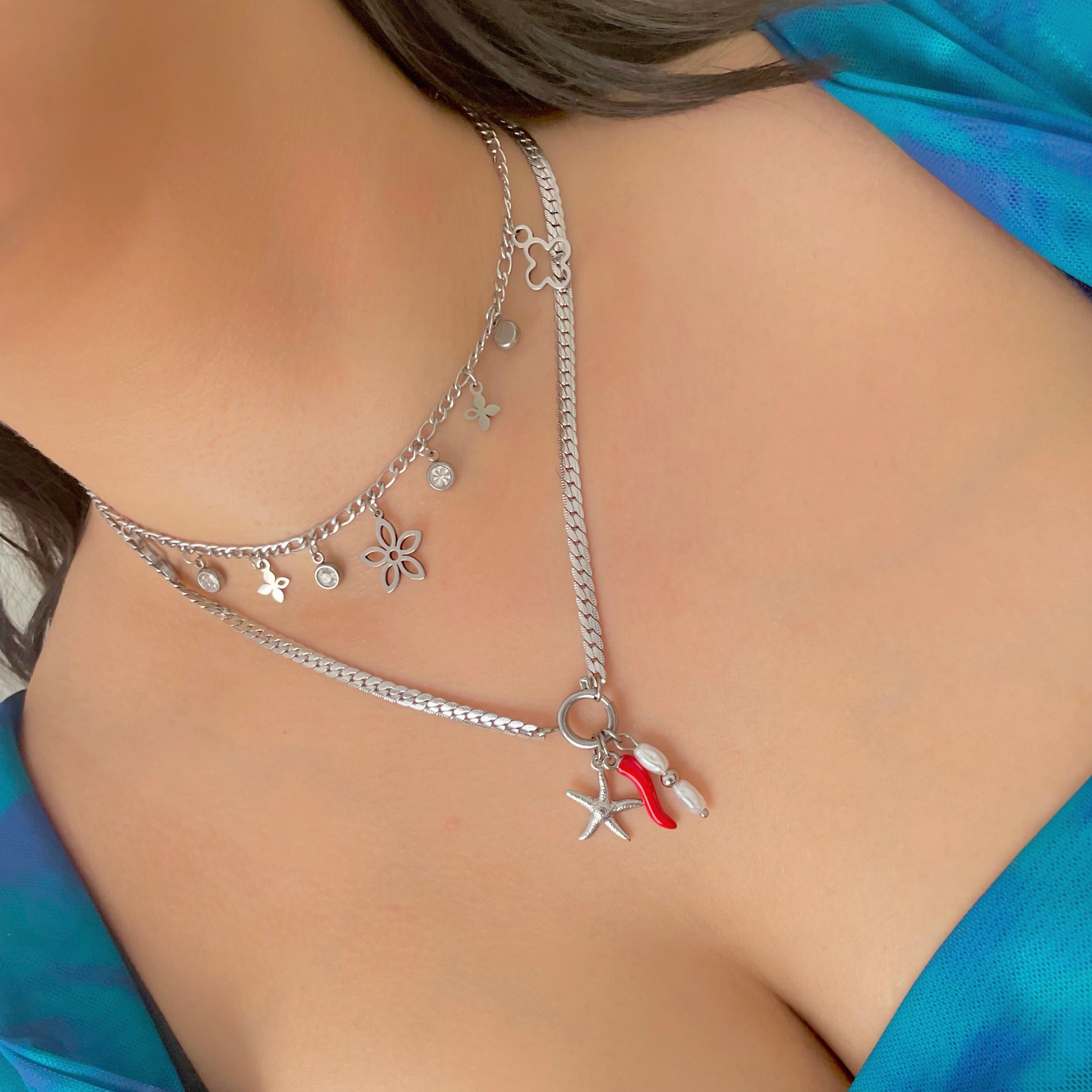 silver necklace stack with chilli charm