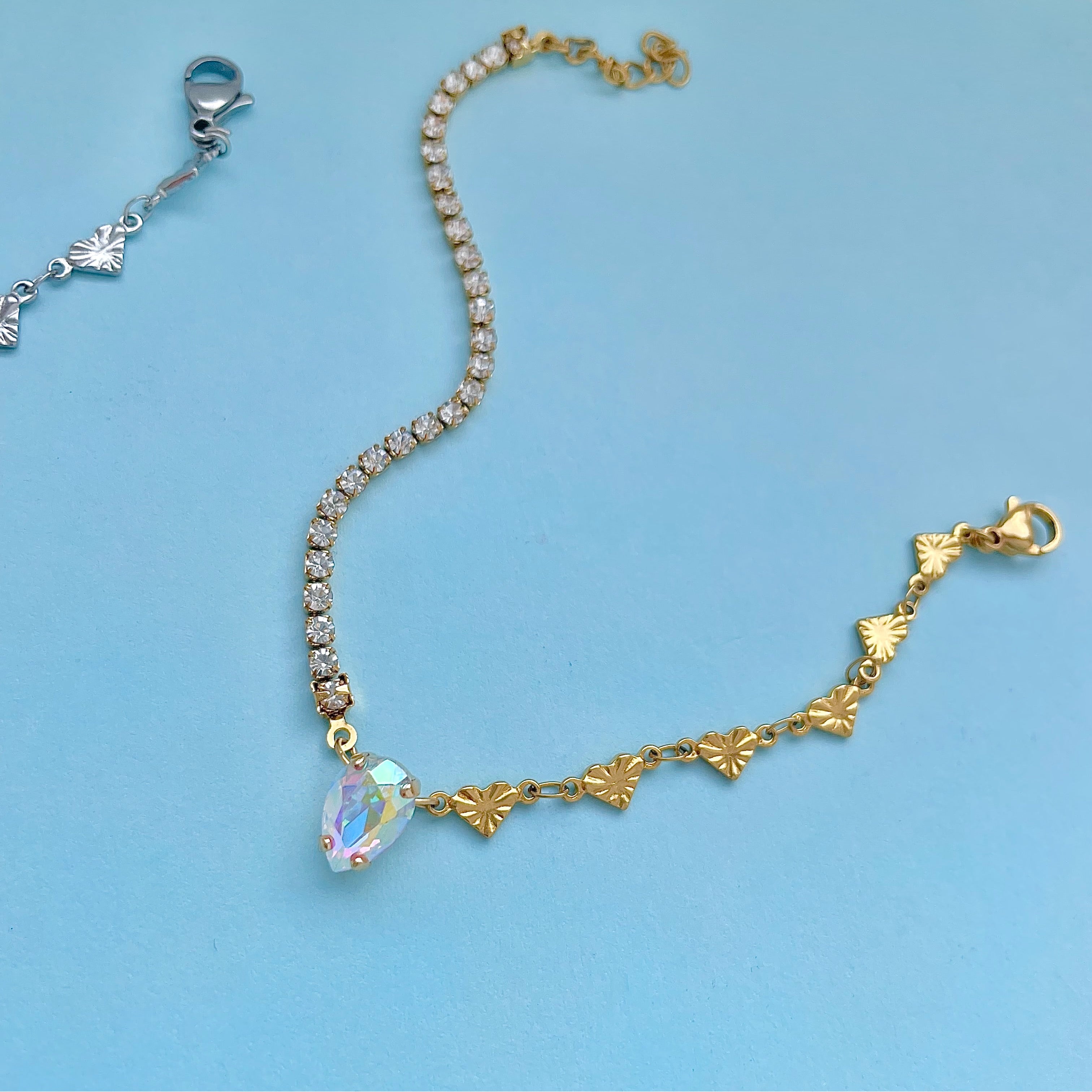 gold crystal tennis necklace with pear crystal
