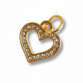 Gold heart-shaped pendant with clear stones on a white background