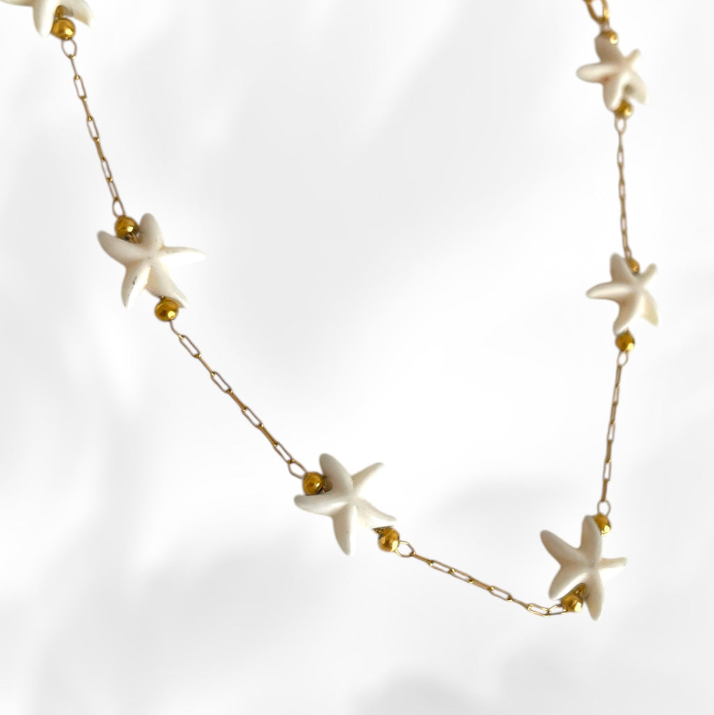 anklet with starfish beads on a white background