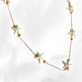 anklet with starfish beads on a white background
