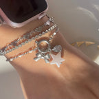 Armband mit glänzendem Verschluss in Gold