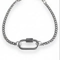 Silver chain bracelet on a white background