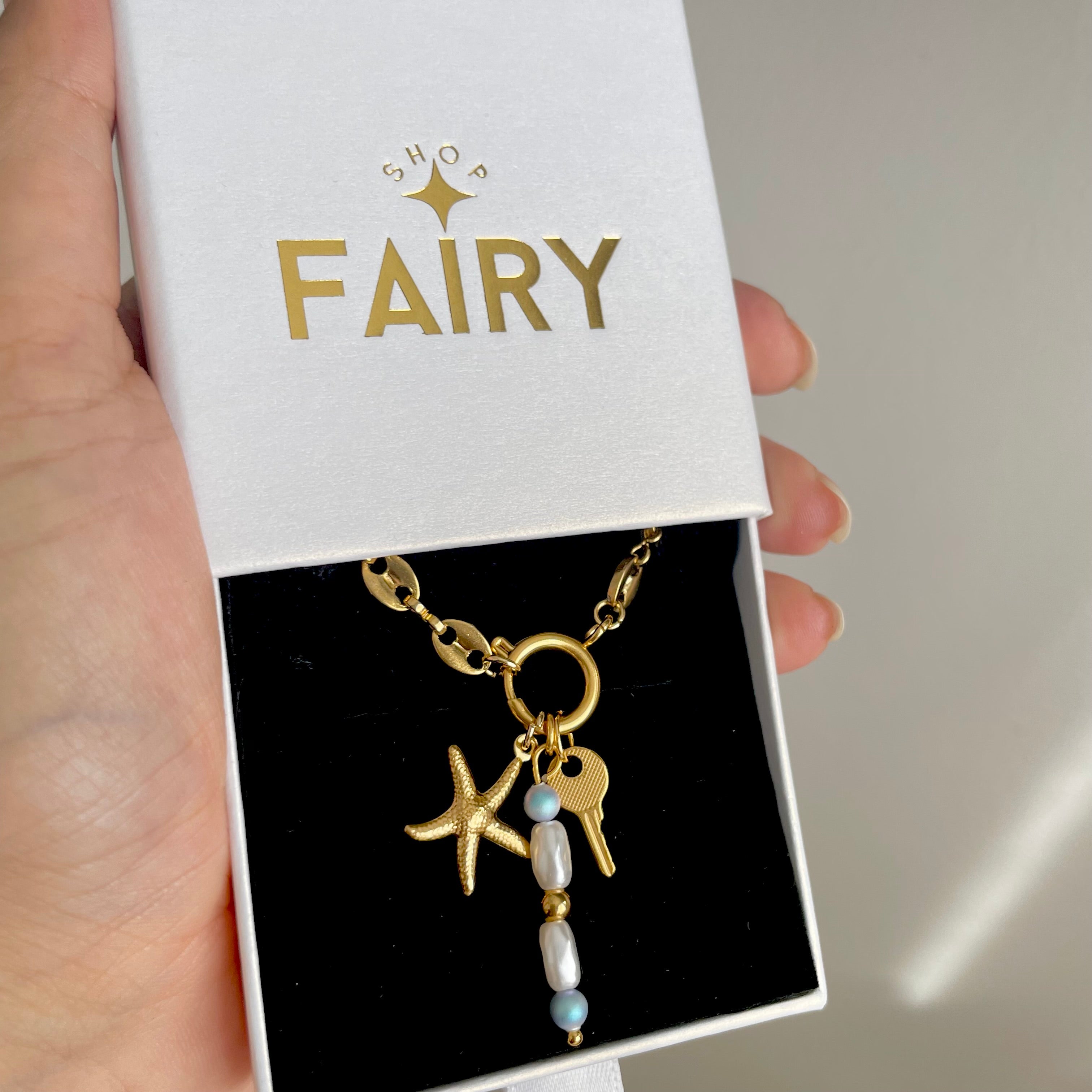 Ritzy Charm Necklace Gold with Siesta Key Charm, Starfish Charm and Pearl Charm