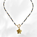 gold summer neckace with flower charm