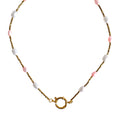 Necklace with pink and white beads on a white background