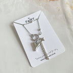 Silver charm necklace with heart charm