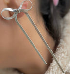Silver steel bow earrings