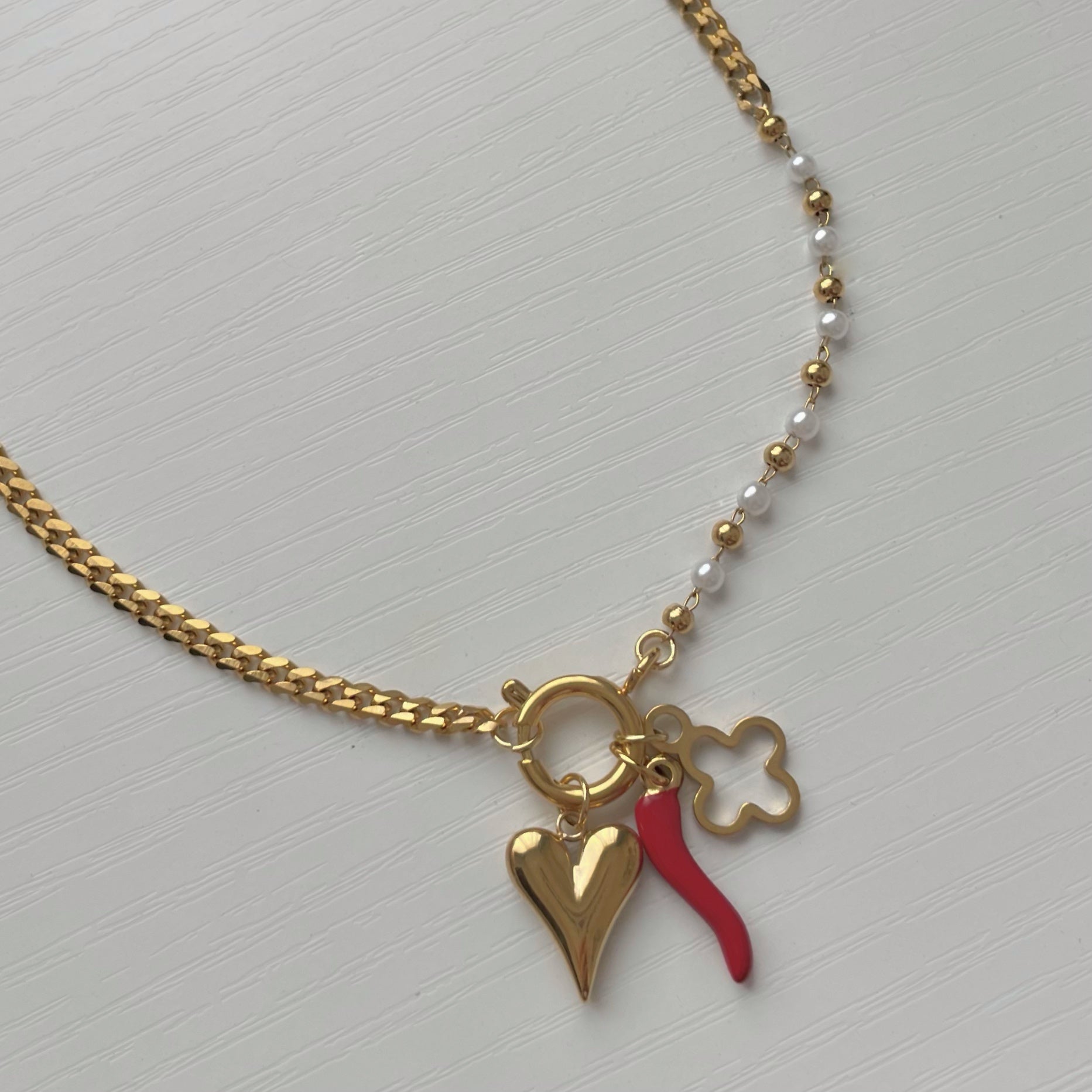 Starlight Pearl Charm Necklace Gold with Chilli harm Clover Charm and Heart Charm