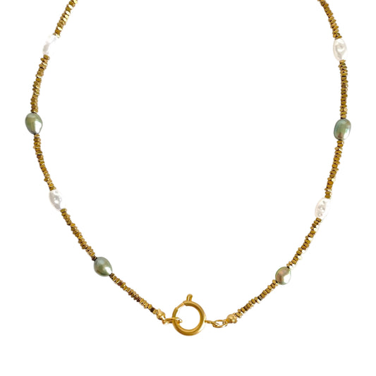 Necklace with gold chain and green beads on a white background