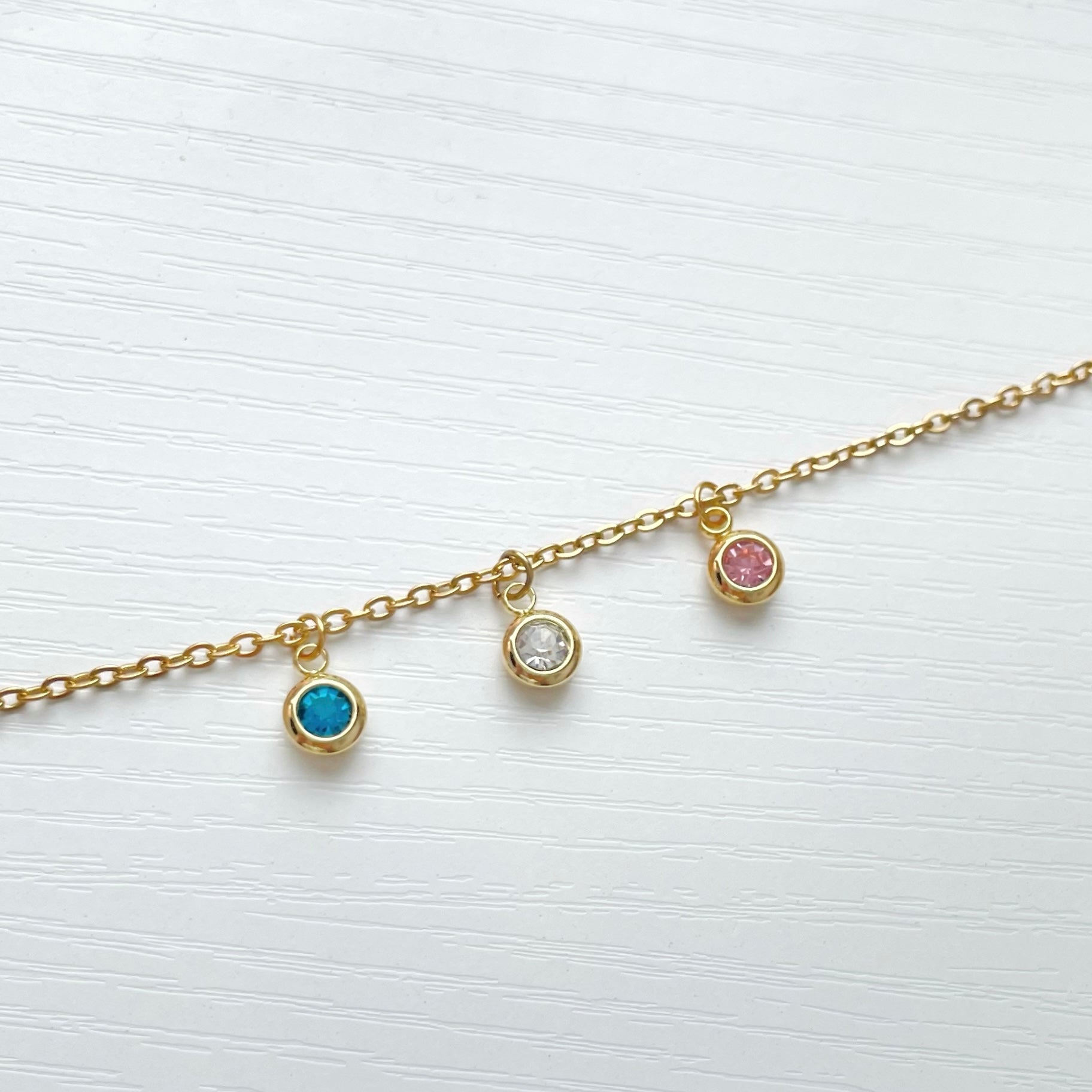 dainty gold birthstone charm necklace