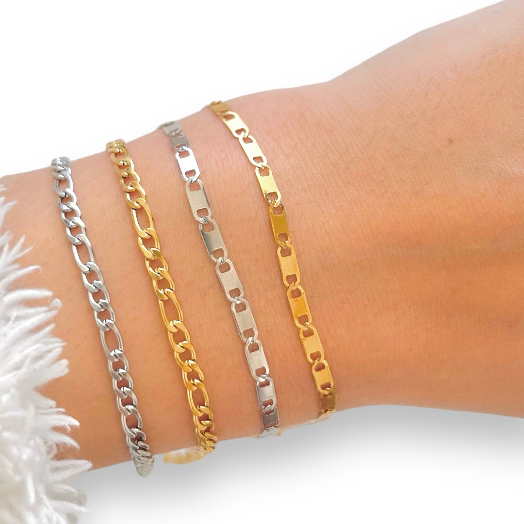 dainty gold bracelet and silver bracelet
