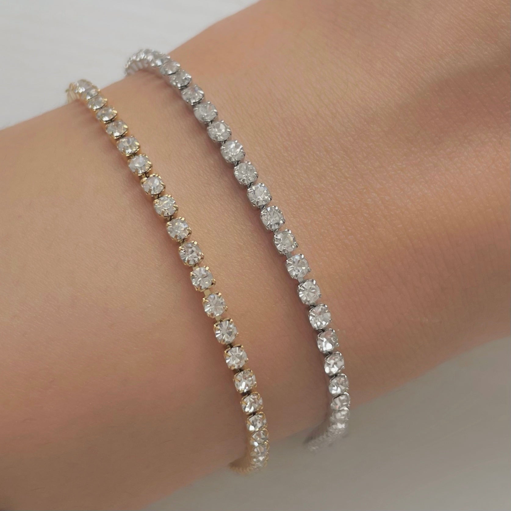 dainty tennis bracelets in gold and silver