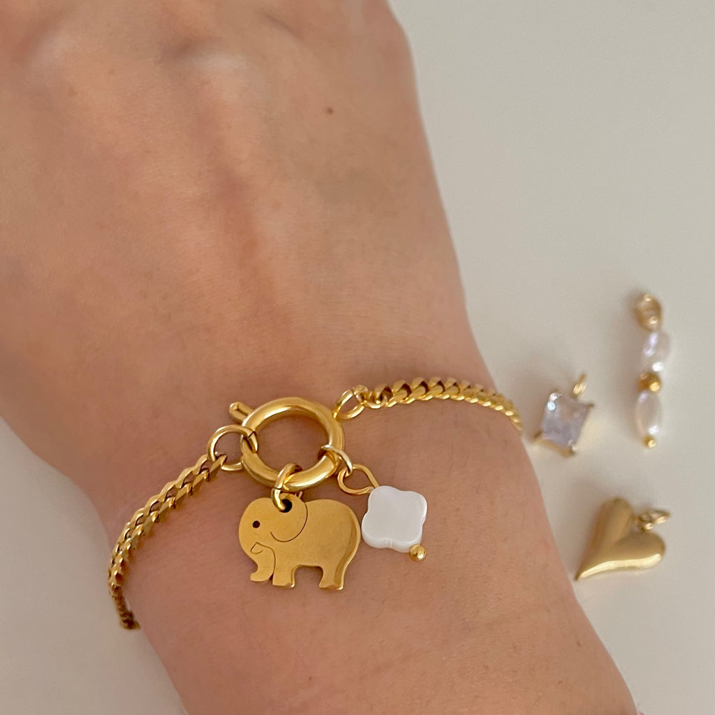 elephant charm on gold charm bracelet