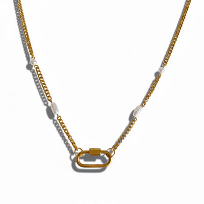Gold chain necklace with a clasp on a white background