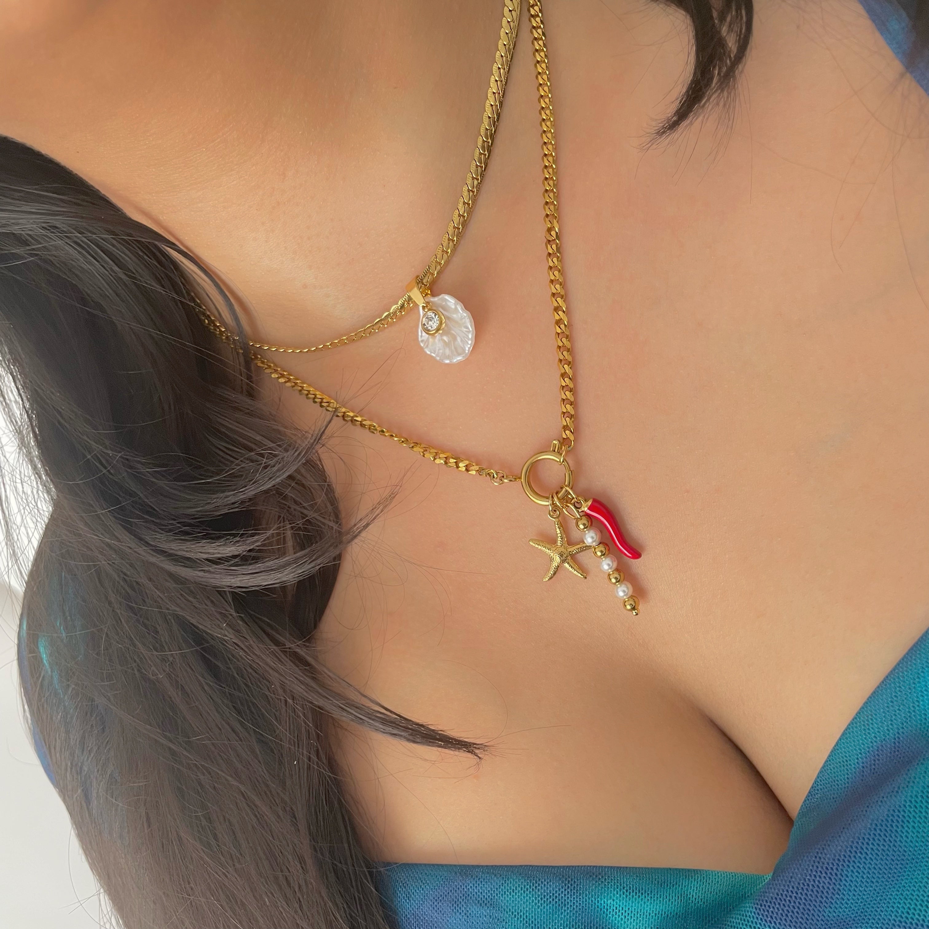 gold charm bracelet with chilli charm and pearl charm