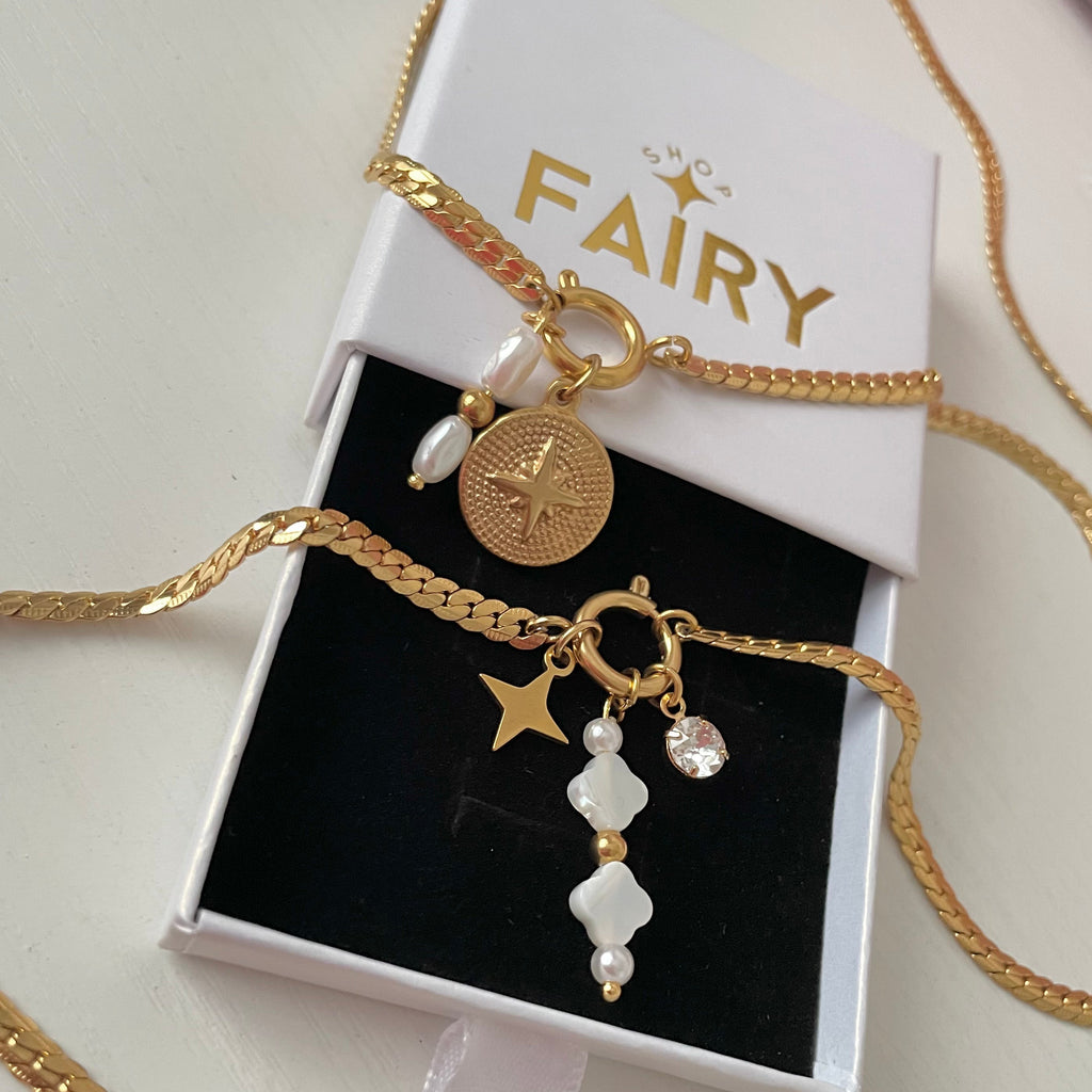 gold charm necklace with clover pearl charm