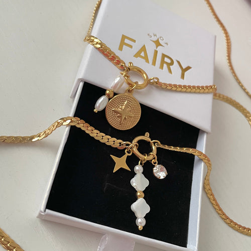 gold charm necklace with clover pearl charm