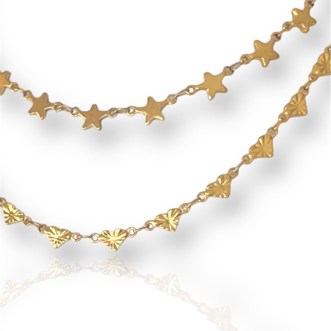 gold star necklace and gold heart necklace