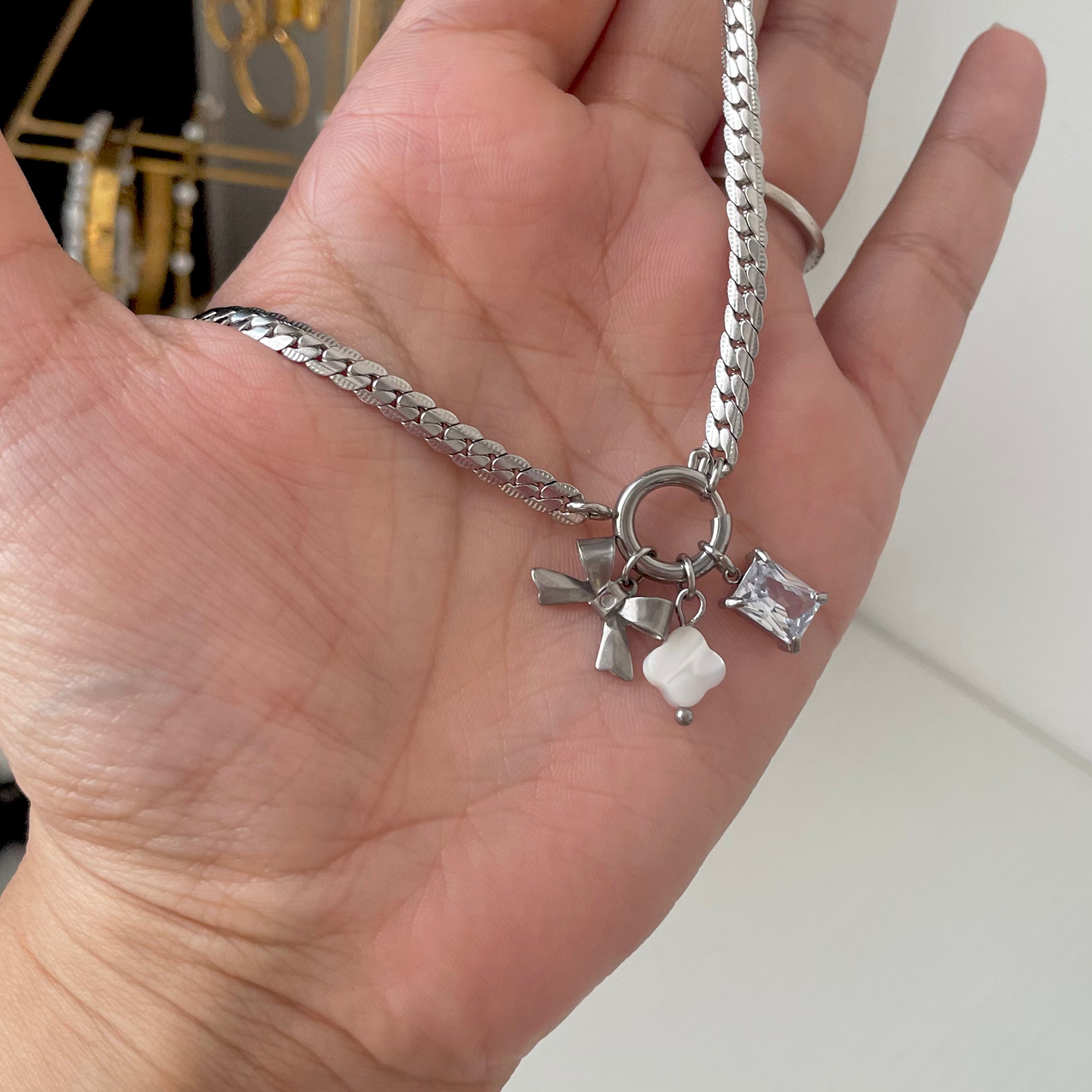 silver charm bracelet with bow charm and rectangle Crystal charm