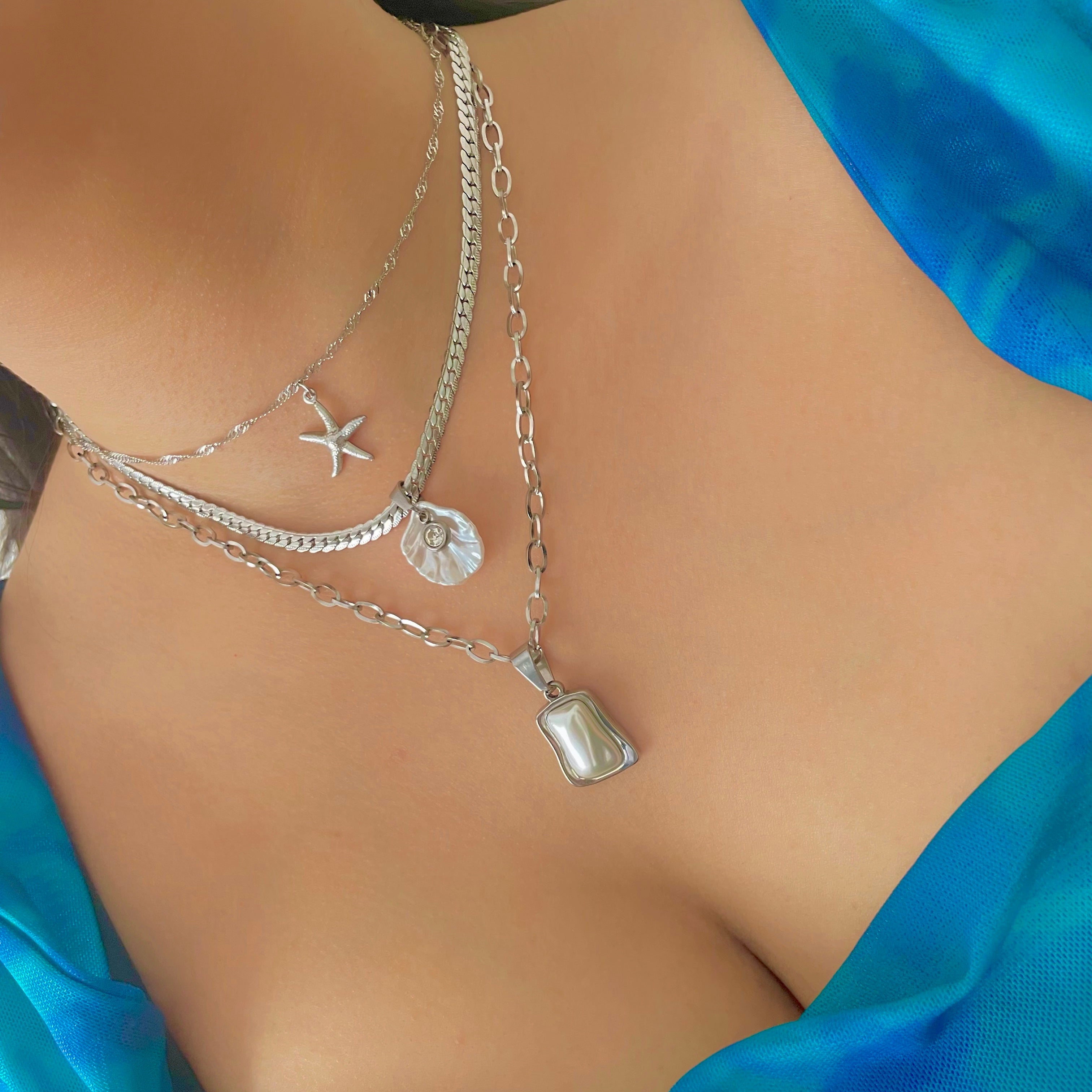 silver necklace stack