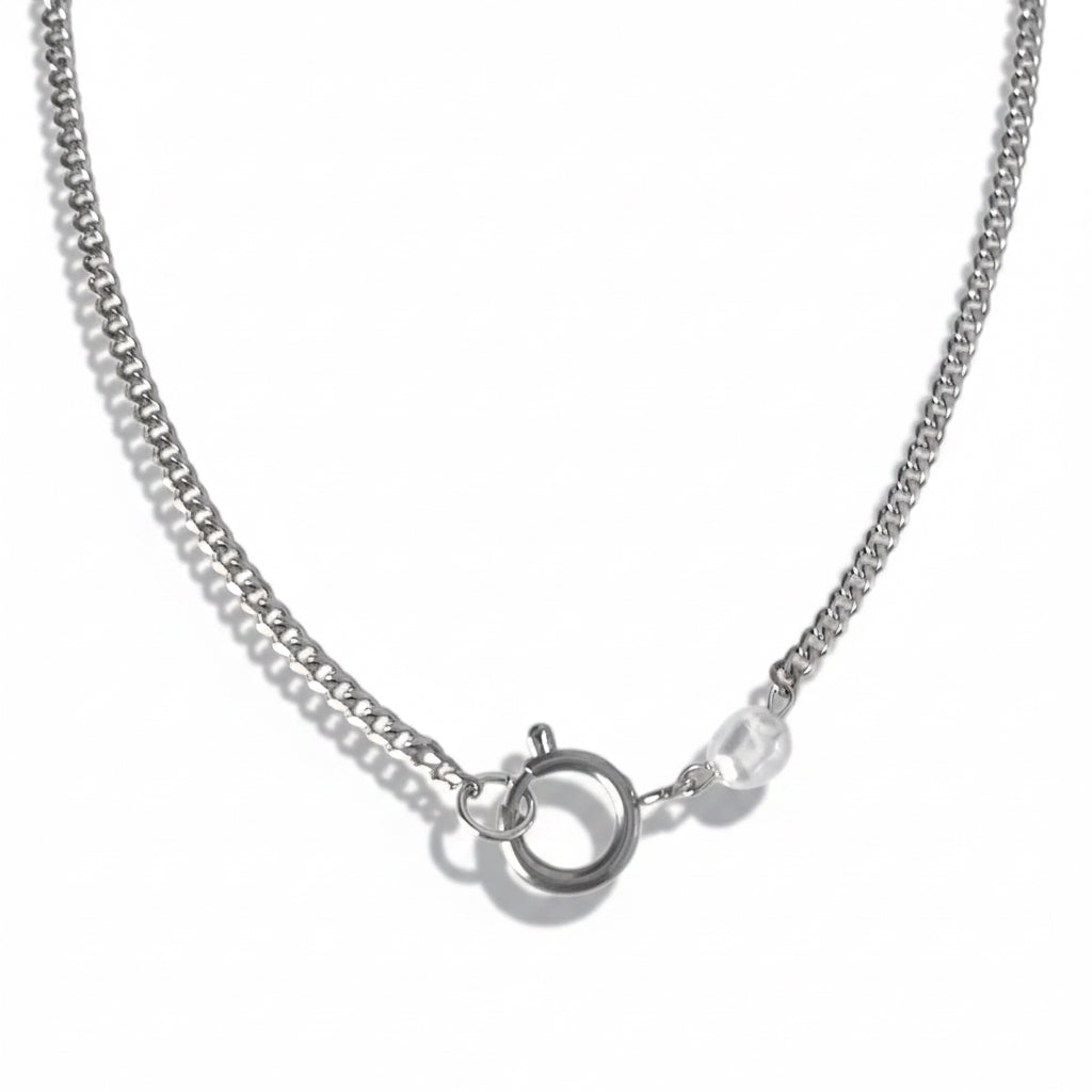 Silver chain necklace on a white background