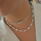 silver pearl necklace with silver dice initial necklace