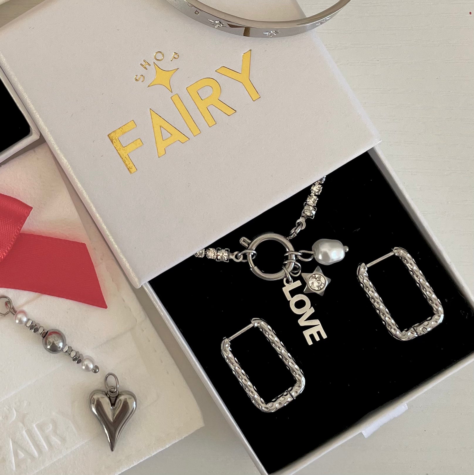 Silver Charm Bracelet with tennis bracelet