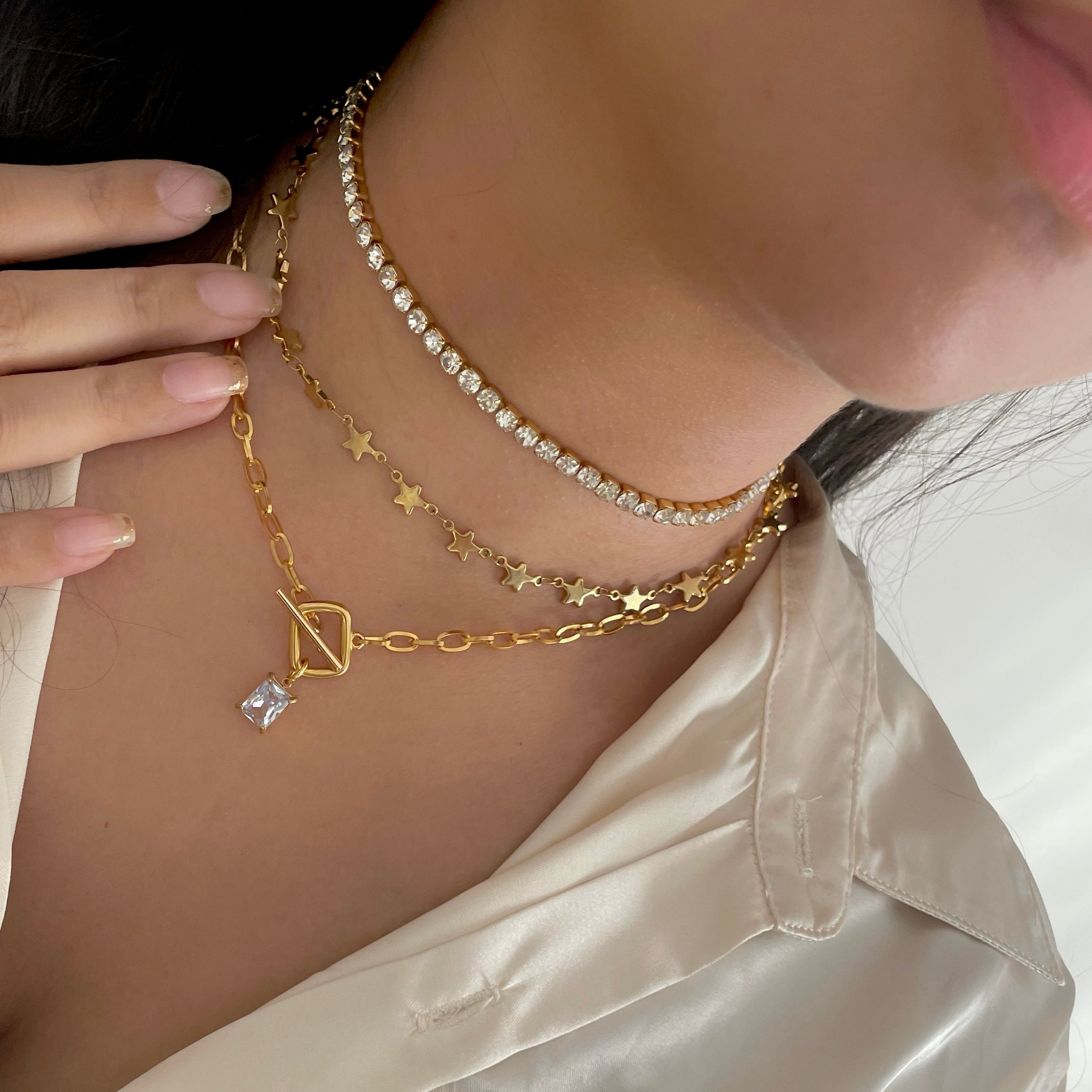 star necklace with gold tennis necklace