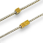 tennis necklace with gold cube initial necklace