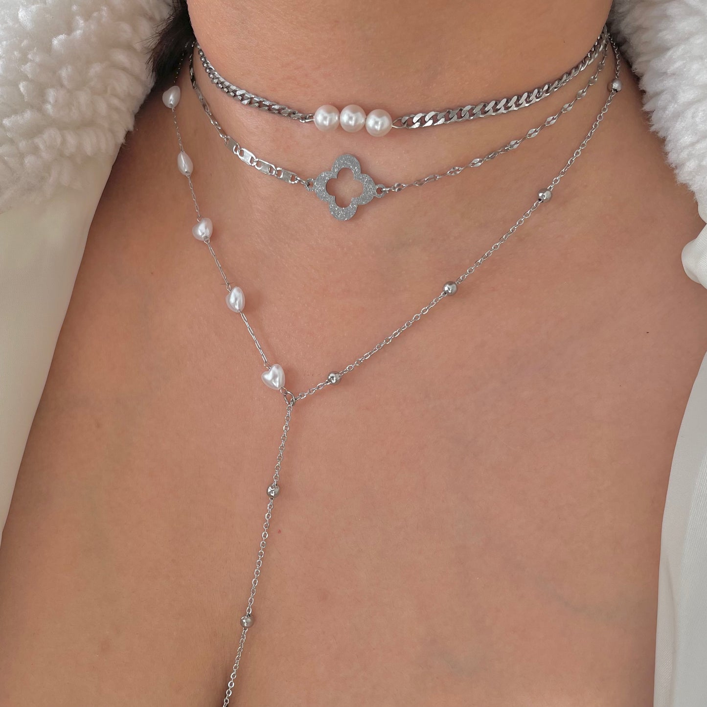 Silver Shimmering Clover Necklace and silver Tennis Necklace