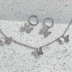 Silver butterfly necklace and matching silver butterfly earrings