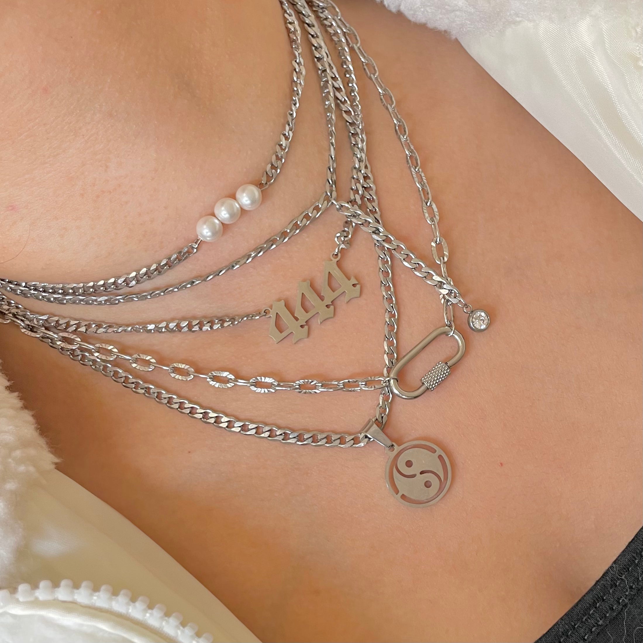 angel number necklace and yin yang necklace
