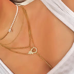 gold pearl necklace with gold necklace stack