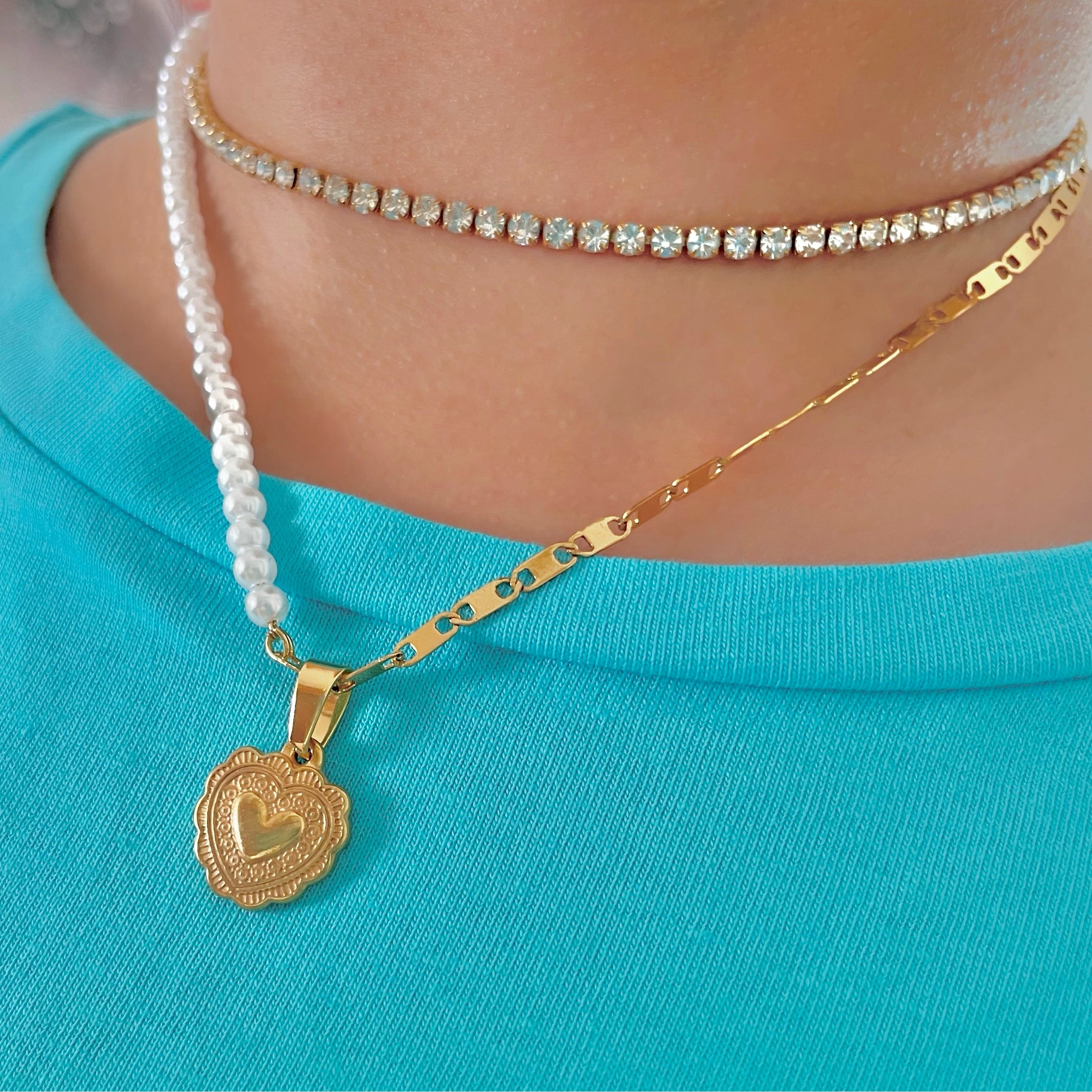 gold tennis necklace with half heart pearls necklace